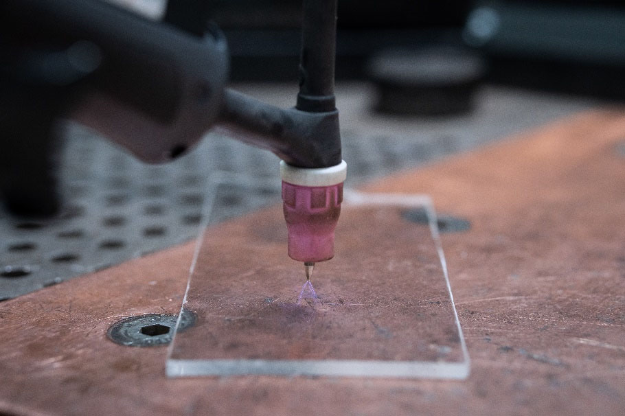 HF breakdown through a plexiglass screen